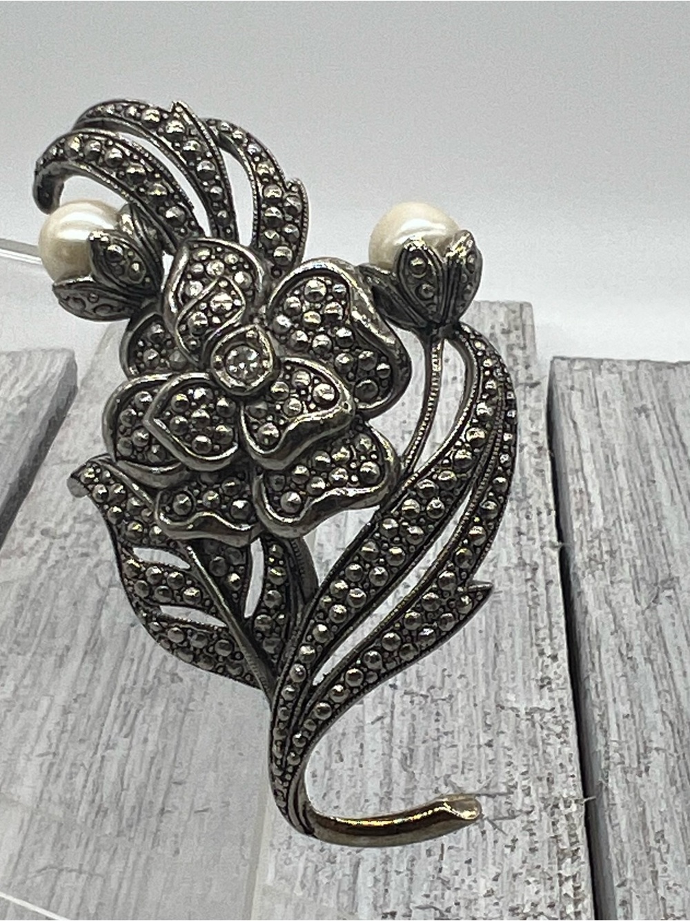 326. Signed KJL for Avon Silver Floral Millgrain Brooch with Faux Pearl Accents